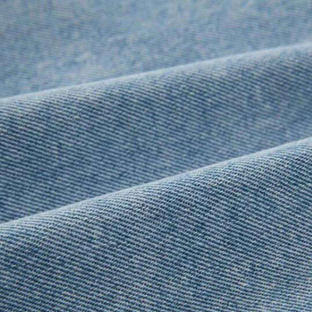 Asymmetric buttoned denim skort